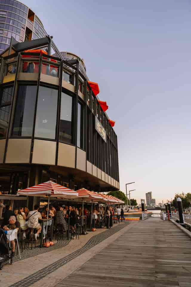 Waterfront Boardwalk at The Reveley: Outdoor event space with high-top seating for corporate events.