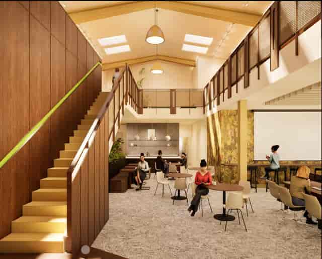 Versatile creative meeting space with modern furnishings for workshops and networking events.