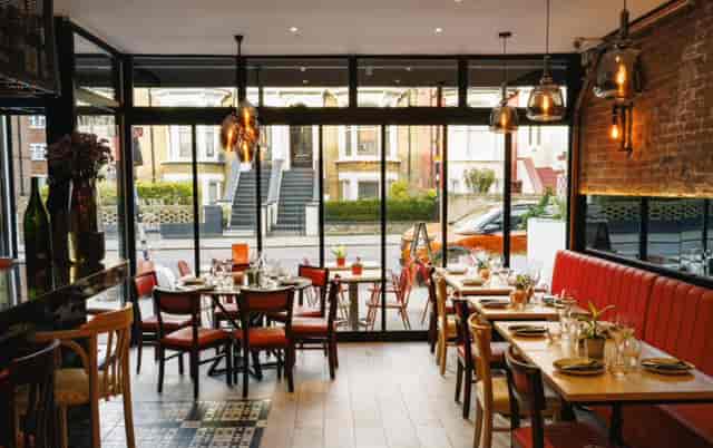 Luna Llena Restaurant: modern venue with natural light for intimate gatherings and events.