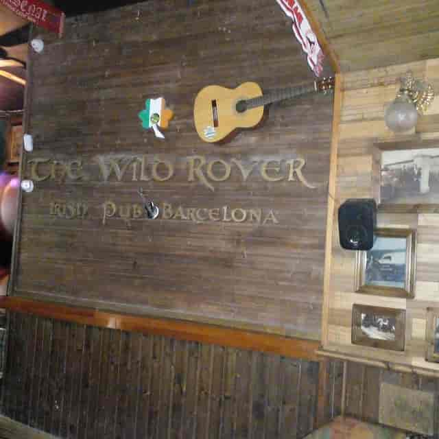 Reserved tables in cozy WILD ROVER pub, ideal for casual gatherings or events.