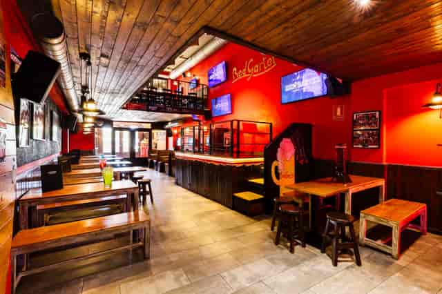 Reserved tables at Red Garter Barcelona for networking events and viewing parties.