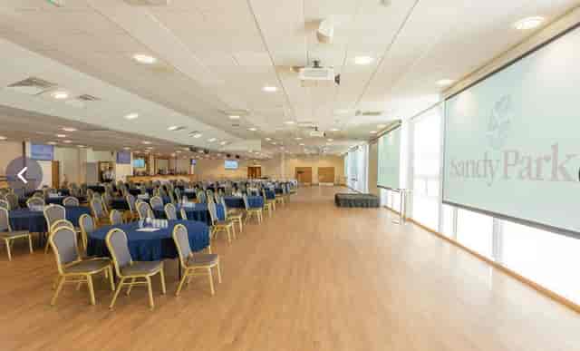 The Estuary Suite at Exeter Rugby Stadium, modern meeting venue with natural light.