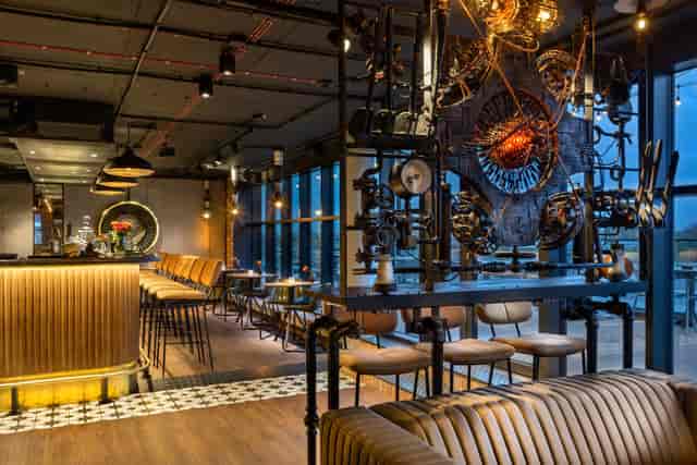 War+Sawa & Bheaven industrial venue with steampunk decor for networking and cocktail events.