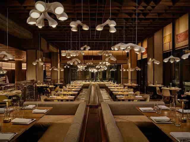 Private Room in Lee: atmospheric corporate dinner venue with dramatic overhead lighting.