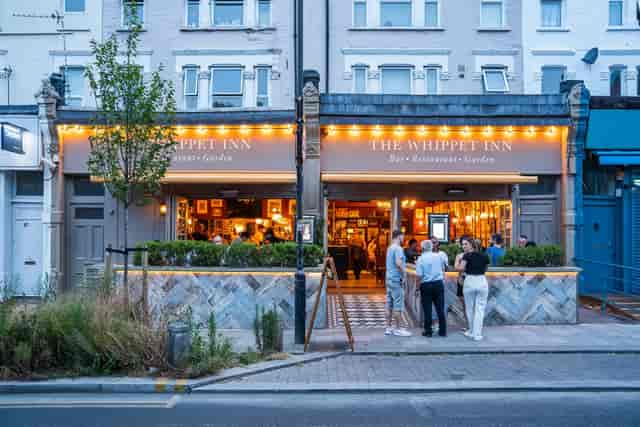 Whippet Inn Garden: inviting outdoor venue for casual meetings and networking events.