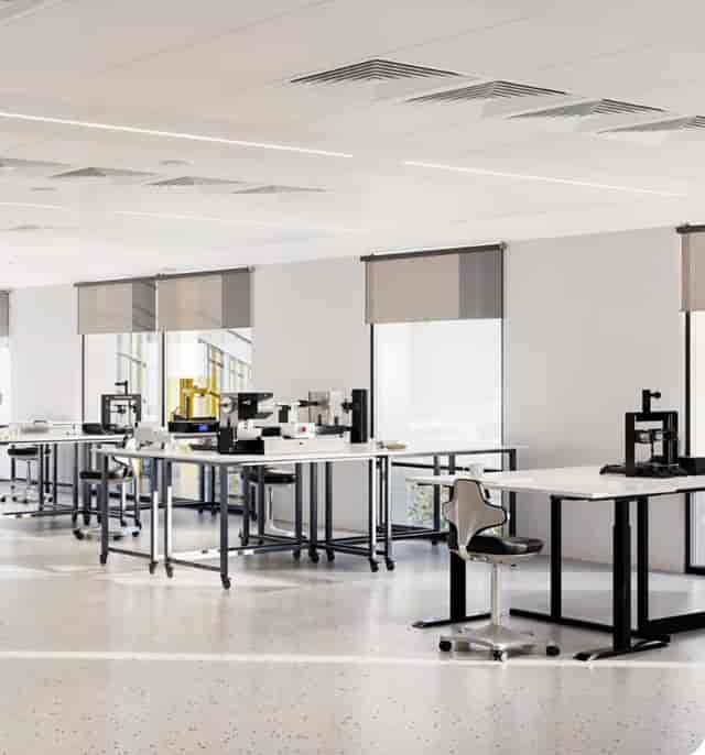 Modern collaborative workspace in PHTA with large windows for workshops and meetings.