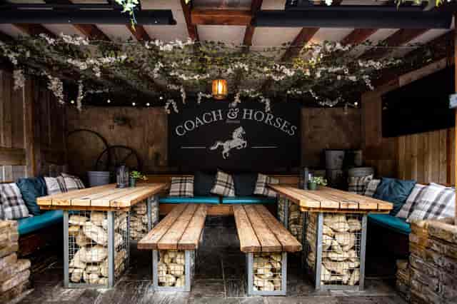 Charming dining room at Coach & Horses, ideal for intimate gatherings and team meetings.
