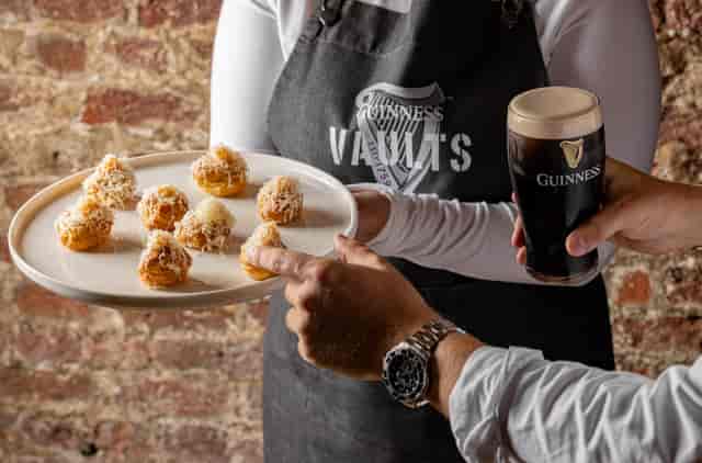 "Barrel Room at Guinness Brewery with gourmet snacks and pints for events"
