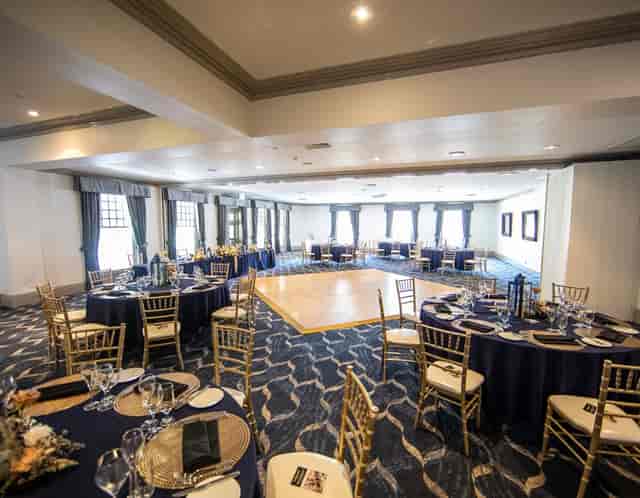 Garden Room ballroom with gold chiavari chairs for weddings or corporate galas.