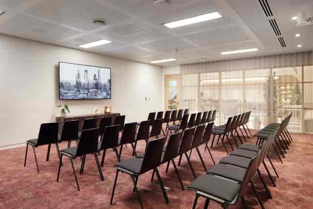Ivory Studio meeting space with modern chairs, ideal for conferences and workshops.