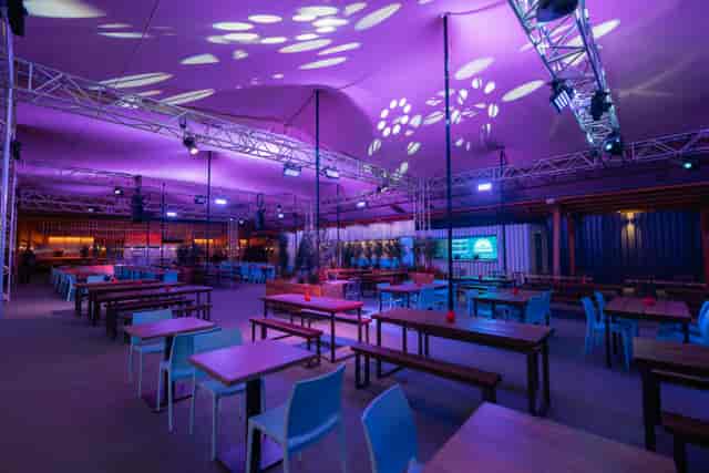 Freight Brixton venue hire with festival-style truss lighting for immersive corporate events.