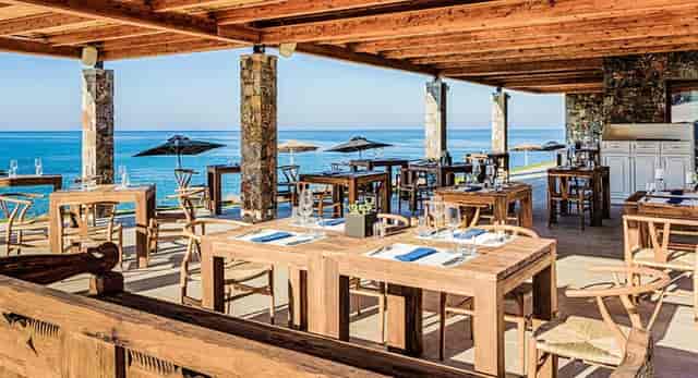 Conference room at Abaton Island Resort with ocean views for corporate retreats and social events.