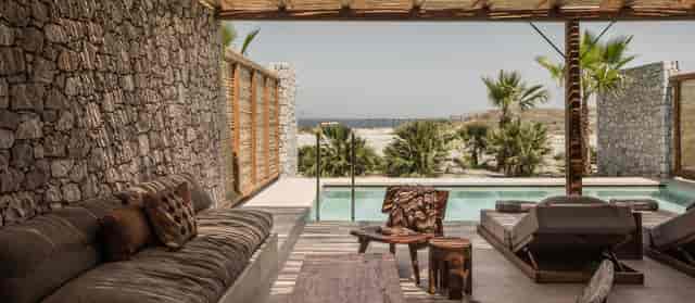 Modern conference room with pool view for intimate gatherings and meetings.