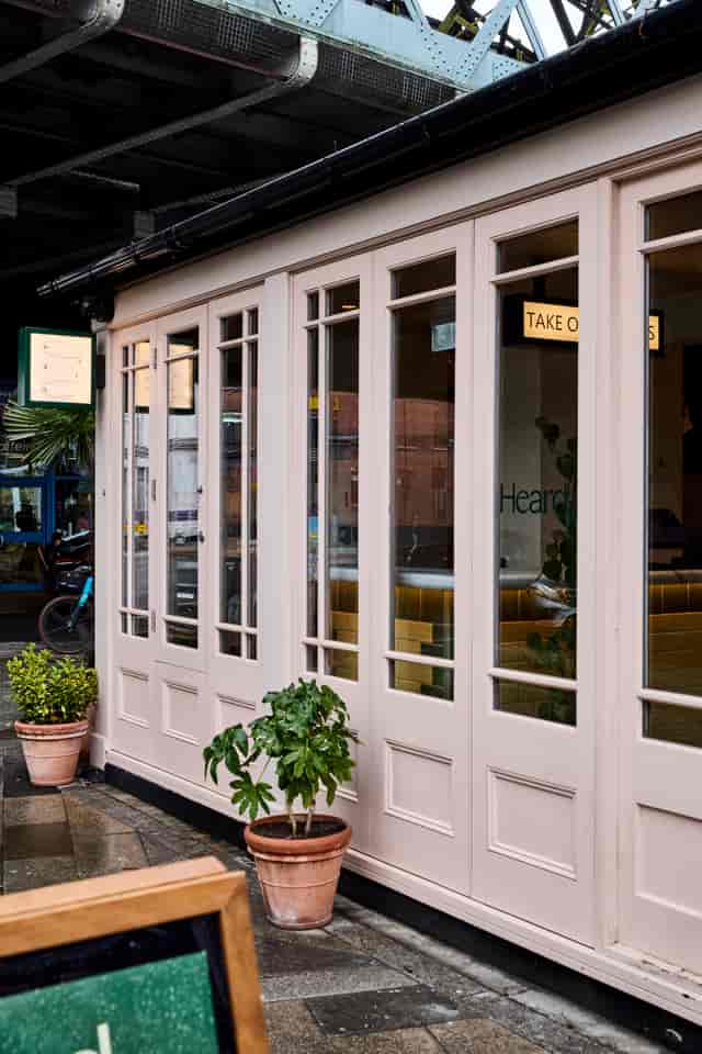 Modern venue entrance at Heard Burger, ideal for events and meetings with natural light.