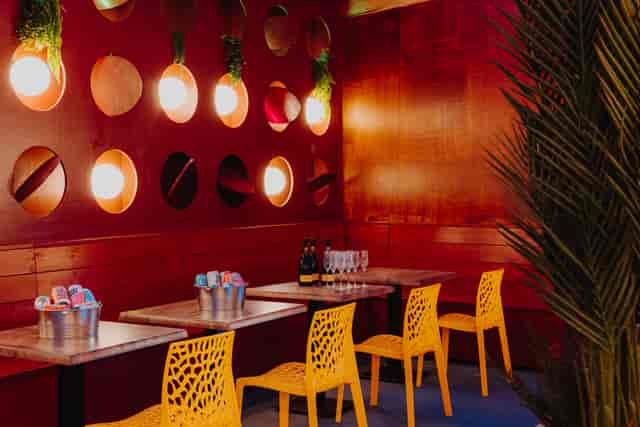 Yellow Zone networking space: modern seating for intimate, high-energy event and brand activations.