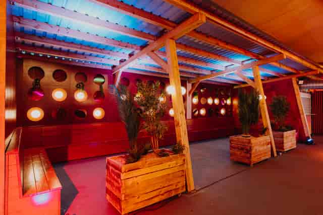 Yellow Zone breakout lounge with tiered seating for corporate events and brand activations.