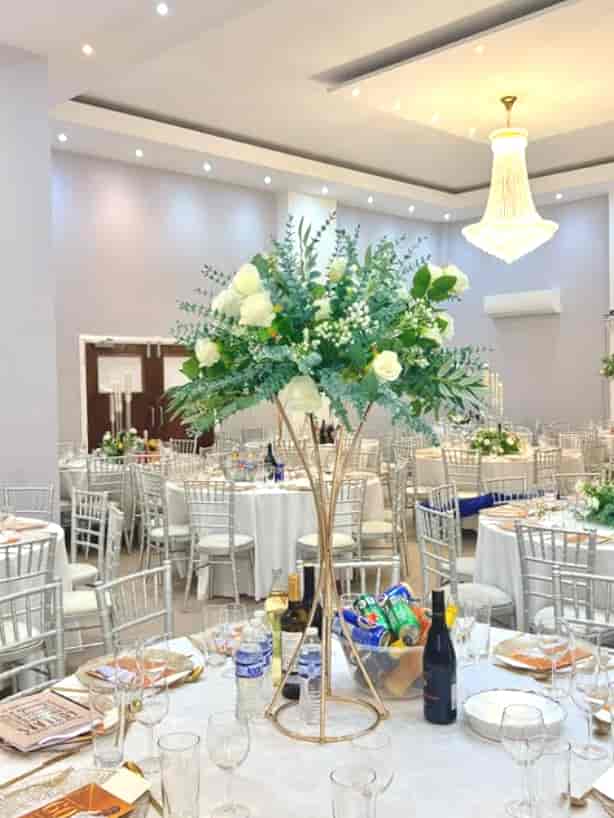 Elegant banquet hall, floral decor, wedding, event venue