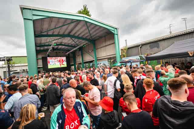 Vibrant crowd at The Big Shed sports viewing party in Ye Olde Trip to Jerusalem.