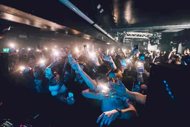 Vibrant live event crowd in Stealth, perfect for networking and engagement opportunities.