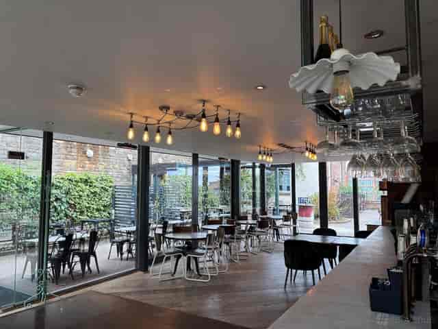 Modern event space with natural light, ideal for corporate functions and gatherings.