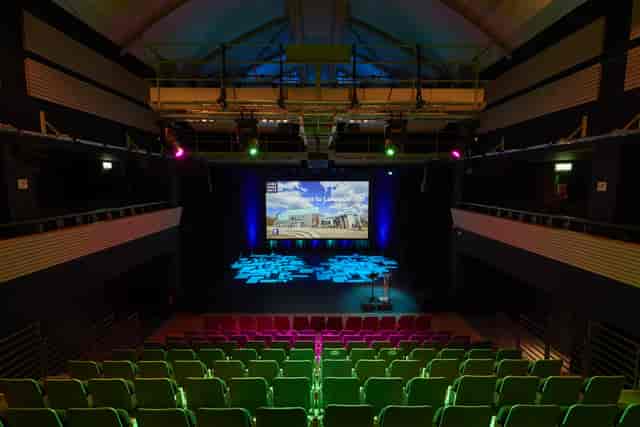 Recital Hall at Lakeside Arts: tiered seating and vibrant lighting for events.