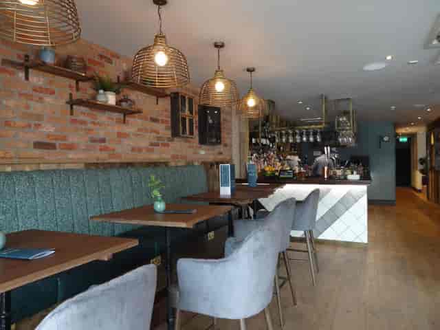 Modern dining space in The Snug, ideal for private events and networking.
