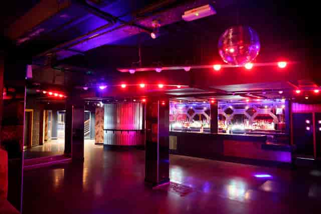 Main Room at Palais Nottingham, versatile event space with modern lighting for gatherings.