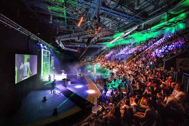 Main Arena stage at Motorpoint Nottingham: AV production setup for large-scale corporate events.