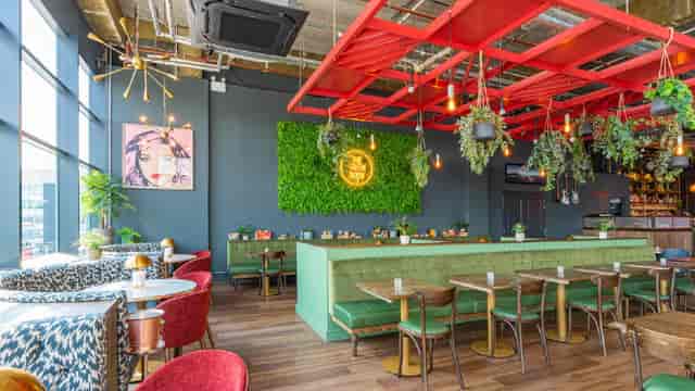 The Green Room at Motorpoint Arena: modern venue with lush greenery for events and meetings.