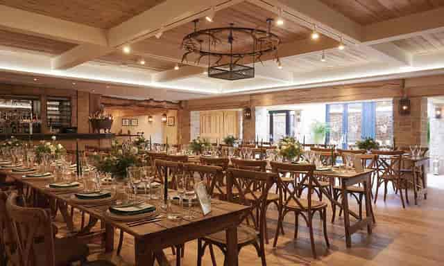Wild Thyme & Honey Suite: rustic wedding venue with floral decor and natural light.