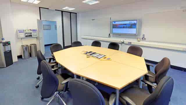 Boardroom setup in Venue Henley for collaborative workshops and strategy sessions.