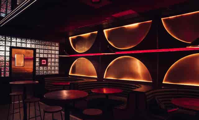 Stylish dimly lit venue for private gatherings and networking events in London.