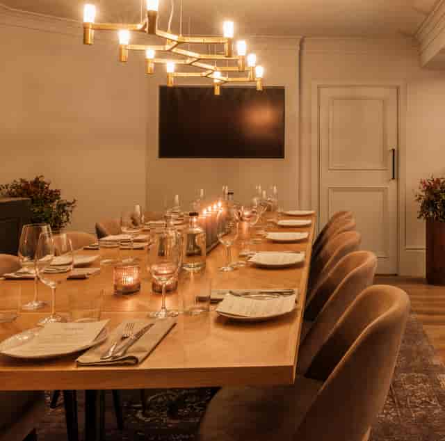 High-end private dining setup at The Loft in Claro, ideal for board dinners and corporate events.