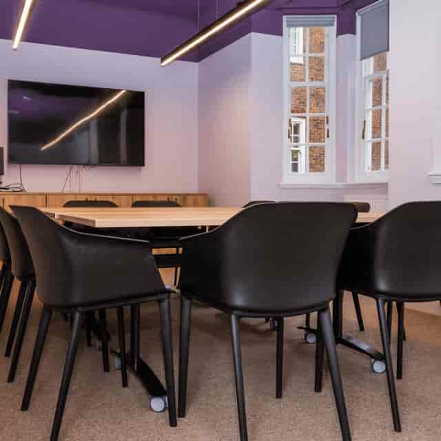 Weybridge Conference Room with sleek table, ideal for meetings and brainstorming events.
