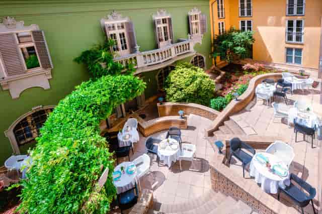 Courtyard reception venue, tiered seating, Budapest event