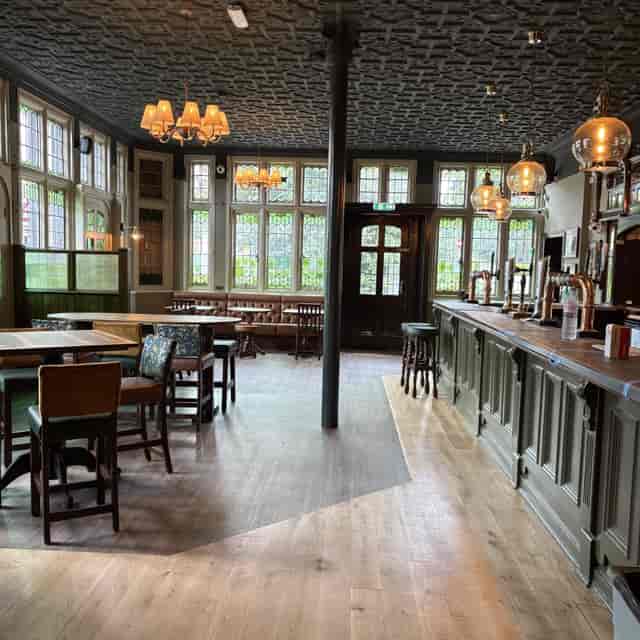 Private event room at The Chapel Market Tavern with booth seating for networking and team building.