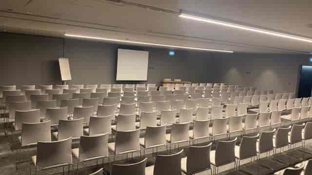Auditorium at Hilton Porto Gaia featuring theater-style seating for corporate conferences or events.