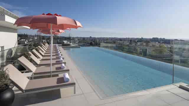 Renaissance Porto Lapa Hotel rooftop infinity pool for luxury corporate cocktail networking events.