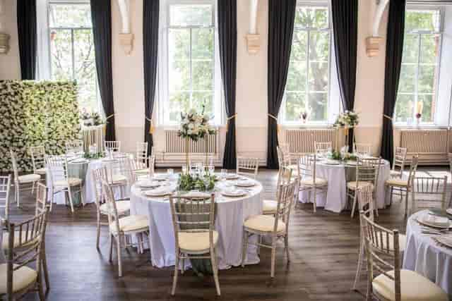 Merryweather Vestry Hall gala banquet with floral centerpieces, wedding reception venue.