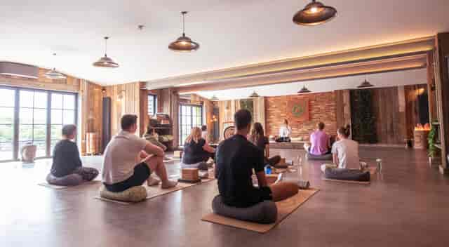Main Barn wellness breakout space with natural light for corporate retreats and team building.