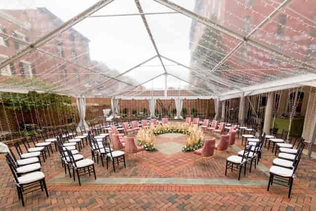 Circular wedding ceremony in fairy-lit tent, THRōW Social DC venue buyout.