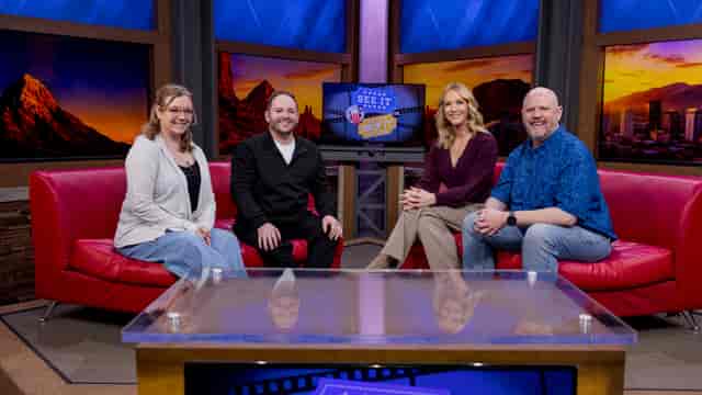 Corporate game show studio with professional lounge seating for hybrid events and live panels.