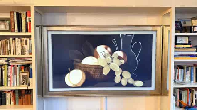 Executive boardroom with integrated digital art display for professional corporate events.