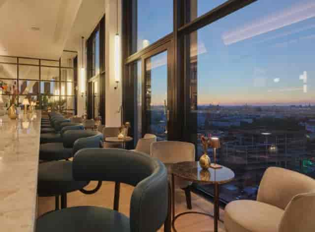 Contemporary rooftop lounge in Munich for corporate networking events and upscale receptions.