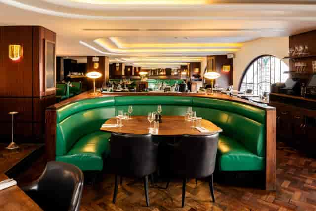 Hawksmoor Air Street bar booth, intimate business dinner setup for private networking events.