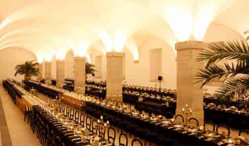 Patio da Galé banquet setup with vaulted ceilings for an elegant corporate gala or dinner.