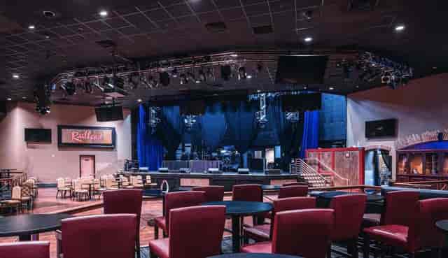 Boulder Station event space with stage and lighting for corporate galas and keynote presentations.