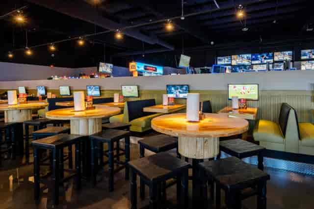 Ojos Locos Sports Cantina booth seating for networking mixers and sports watch parties.