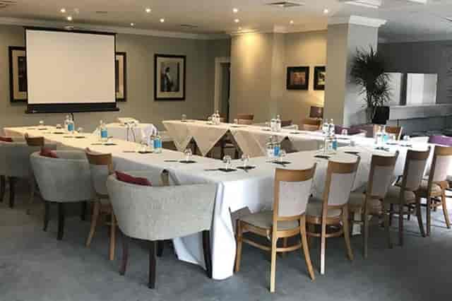 The Writing Room U-shape setup for corporate meetings and event workshops at Poets House Hotel.