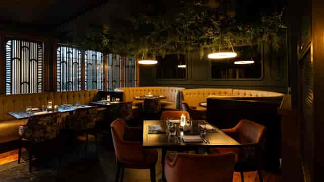 Lake View Lounge: High-end VIP dinner and executive meeting space with plush, biophilic design.